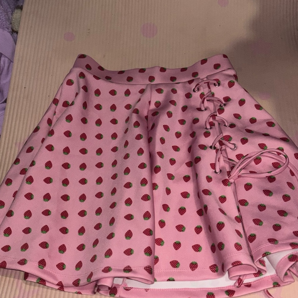 Pink Skirt with Strawberry Print and Lace-Up Detail